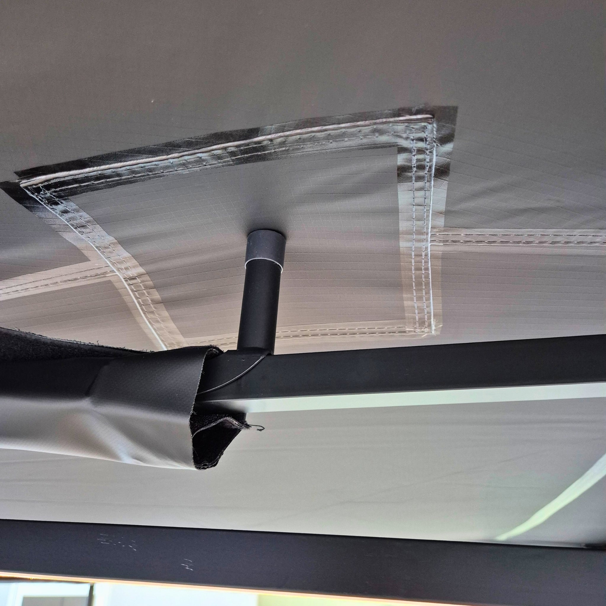 Close up of awning rain arms and canvas detail